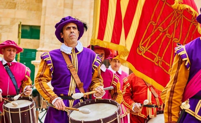 man playing a drum Fiesta Week in Malta
