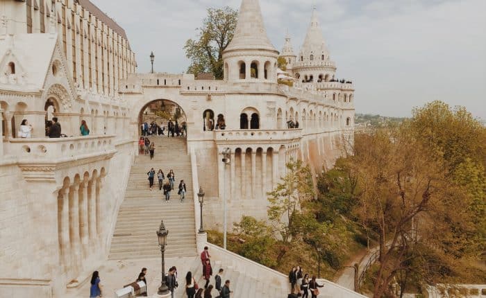 aerial view of a building with people walking around