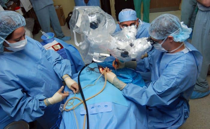 Group of doctors practicing an opertaion Tourism