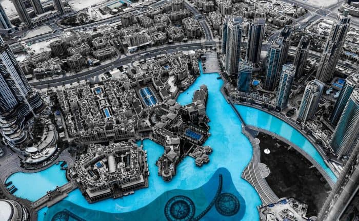 aerial view with pools and highrise buildings in Dubai