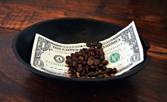 US $1 bill with coffee beans on it
