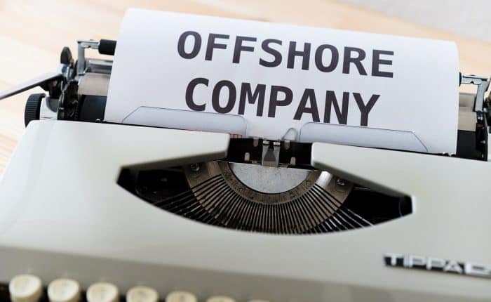 offshore company on a typewriter