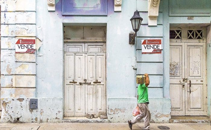 Man carrying box on his shoulder