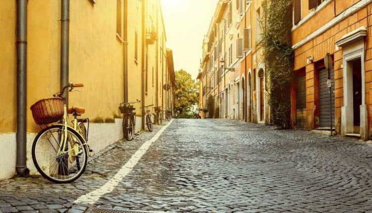 road between buildings in Italy