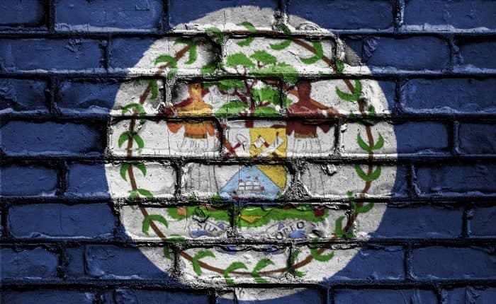 Belize Flag Painted On A Brick Wall