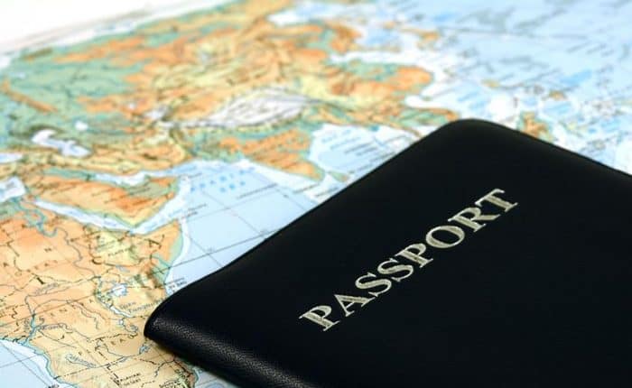 a passport over the globe