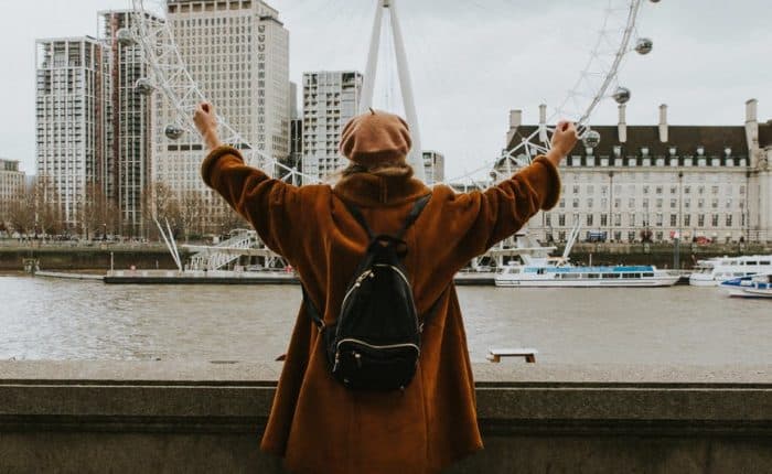 woman holding ferris wheel