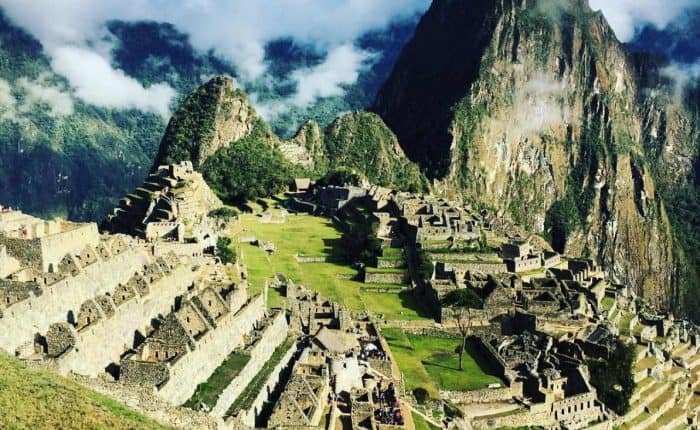 mountains colliding with clouds