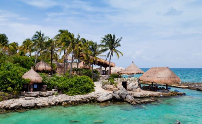 a beautiful island surrounded by aqua waters