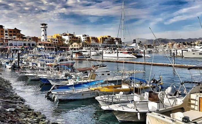 row of boats at a beautiful port