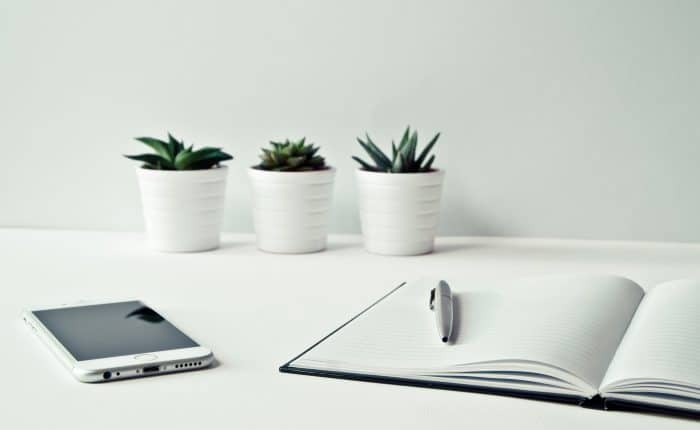 Cell phone with pen and notebook